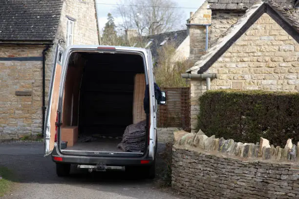 photo of qsx van pulling up outside a house 2